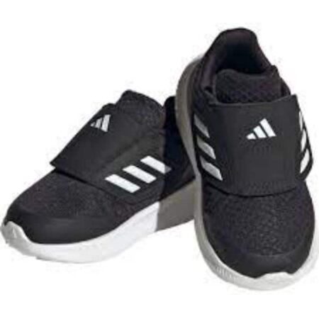 נעלי ספורט לאדידס תינוקות בצבע שחור לבן עם סגירת סקוץ זווית מהצד על רקע לבן